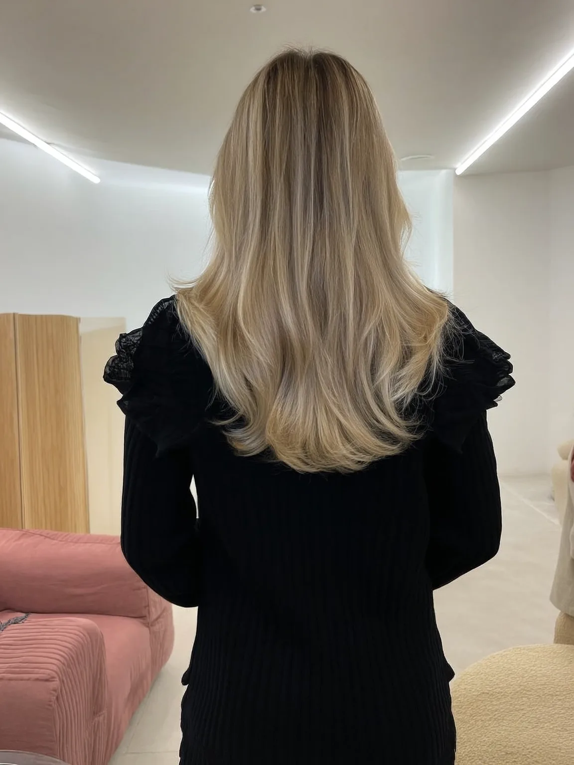 Long Layered Cut with Soft Sandy Blonde Highlights